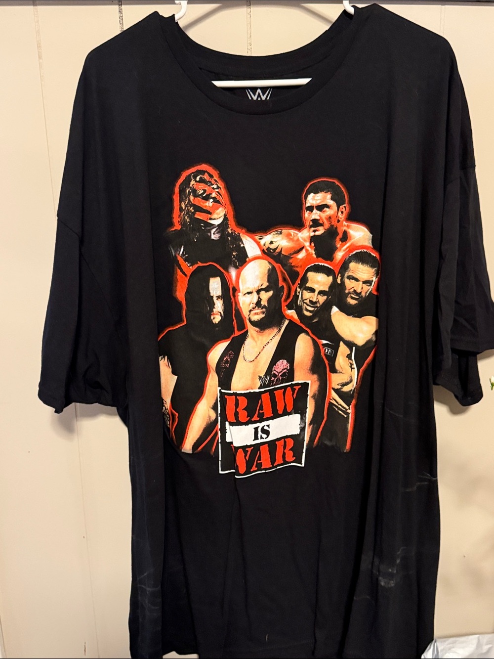 WWE Black T-Shirt with Red and White 'Raw Is War' Multi-Wrestler Graphic
